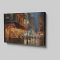 Framed canvas print of an impressionistic cityscape at twilight with a café terrace and bustling streets