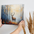 Framed canvas print of a majestic stag in a sunlit, impressionistic autumn forest