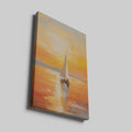 Framed canvas print of an impressionistic sunset seascape with golden colours and a sailboat