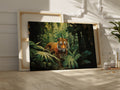 Framed canvas print of a majestic tiger amidst vibrant green tropical foliage