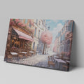 Framed canvas print of a picturesque Parisian alley with cherry blossoms and a street cafe scene in springtime