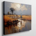 Framed canvas print of a tranquil African savannah landscape with warm sunset and water reflections