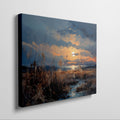 Framed canvas print of an impressionistic sunset over a coastal landscape with vibrant warm hues