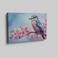 Framed canvas print of a colourful bird on a blossoming cherry branch