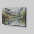 Framed canvas print of an Asian landscape with traditional pagoda and serene lake