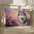 Framed canvas print of a stylised wolf portrait with a pastel floral background and sunset colours