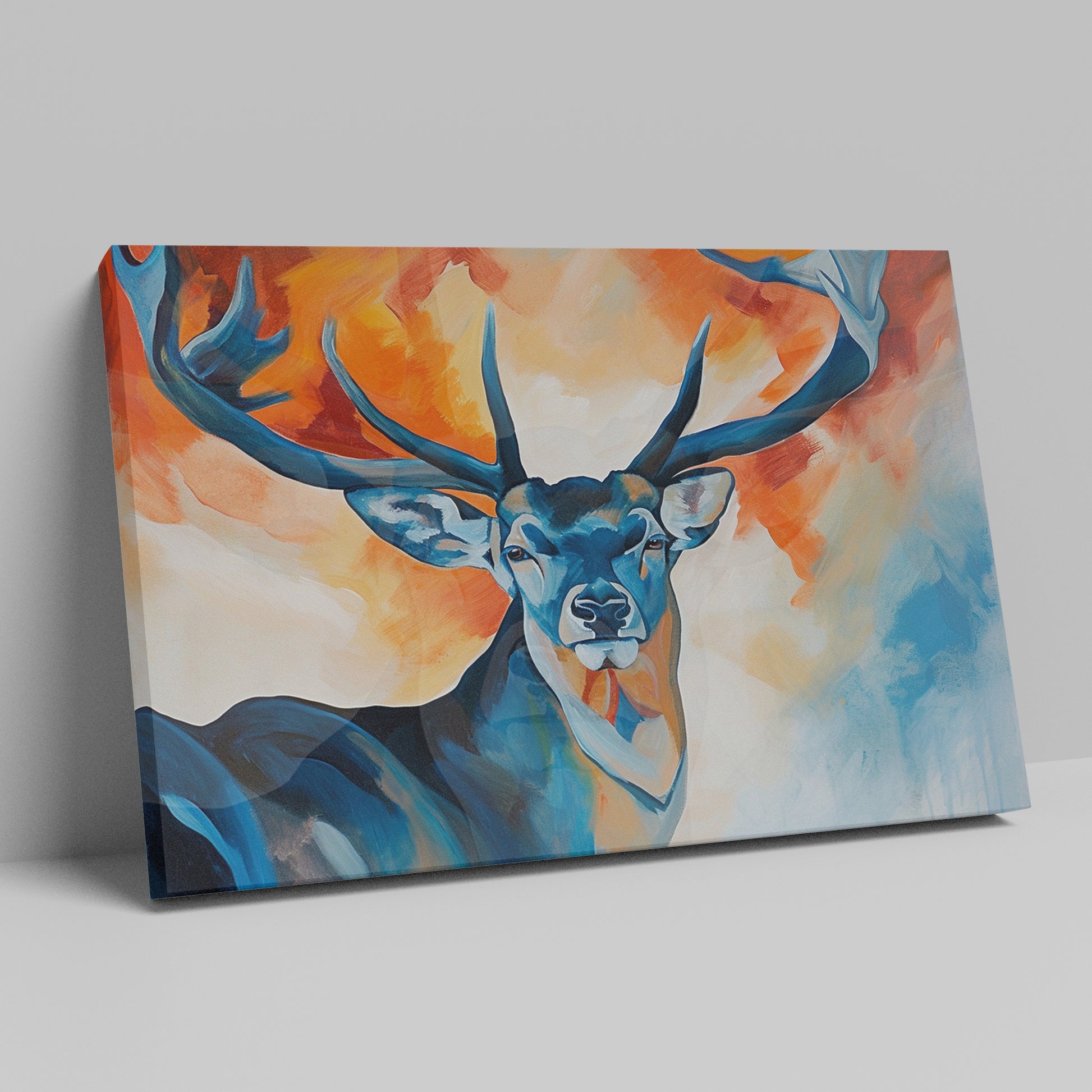 Framed canvas print of a stylized stag with abstract blue and orange background