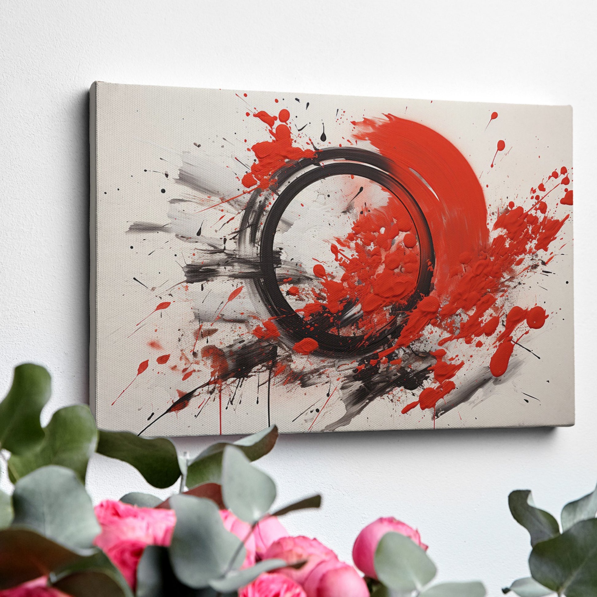 Framed canvas print of explosive red and black abstract art with dynamic splatters and bold strokes