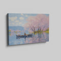 Framed canvas print of Impressionist-style cherry blossoms over a lake with a rowboat