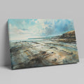 Framed canvas print of a serene watercolour coastal landscape with soft blues and natural earthy tones