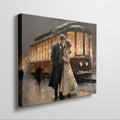 Framed canvas print of a romantic couple embracing on a snowy evening by a vintage streetcar