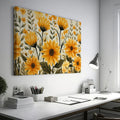 Framed canvas print of golden sunflowers and green foliage on a neutral background