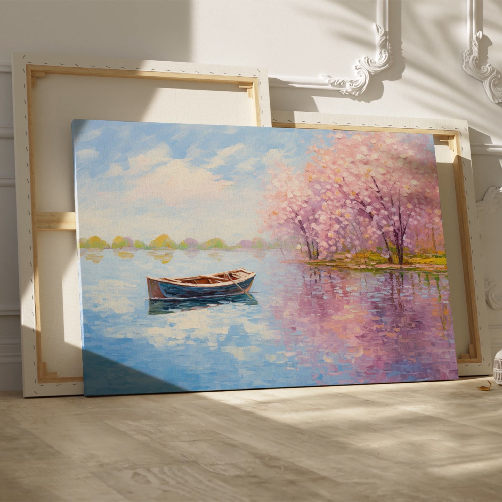 Framed canvas print of an impressionist painting featuring cherry blossoms and a serene lake with a boat