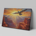 Framed canvas print of a majestic eagle soaring over a stunning canyon at sunset with radiant orange and red hues