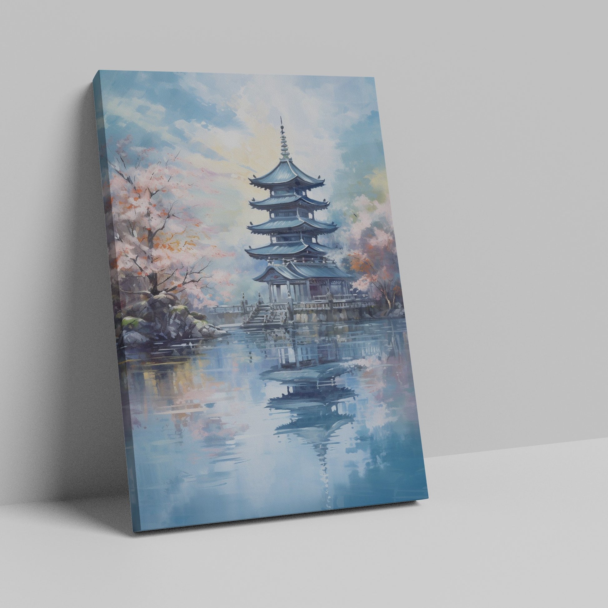 Framed canvas print of a traditional Japanese pagoda and cherry blossoms beside a reflective lake