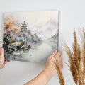 Framed canvas print of a traditional Oriental landscape with pagoda, autumn trees, and misty mountains