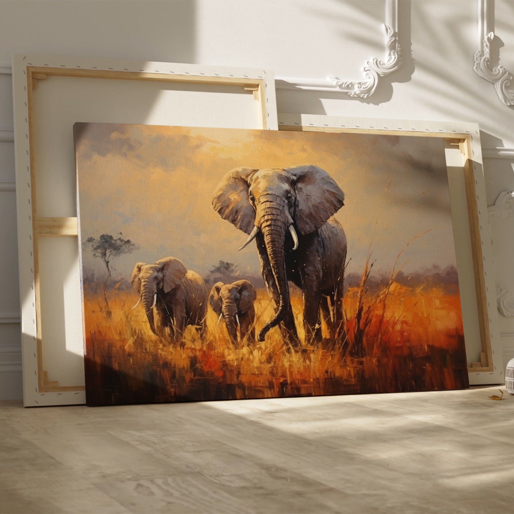 Framed canvas print of a family of elephants in a vibrant, golden savannah sunset