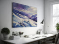 Framed canvas print of a snowy mountain landscape in watercolour with shades of purple and blue