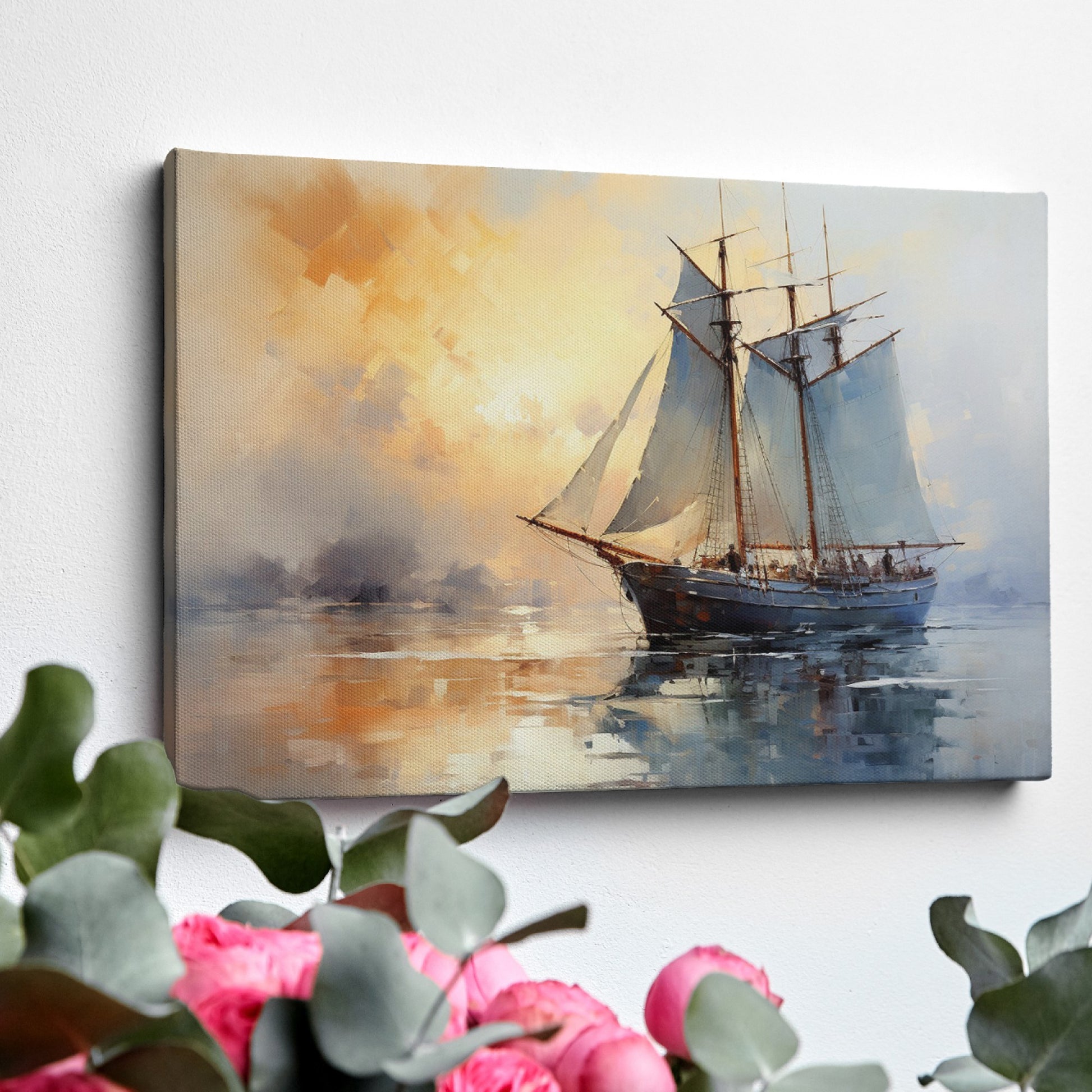 Framed canvas print of an impressionist painting featuring a sailboat against a sunset sea with warm orange and cool blue hues