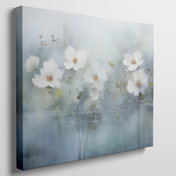 Framed canvas print of serene watercolor flowers with soft blue hues and water reflections