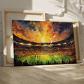 Framed canvas print of an impressionist football stadium with vibrant sunset hues