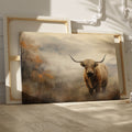 Framed canvas print of a Highland cow in a misty autumnal landscape with warm earthy tones