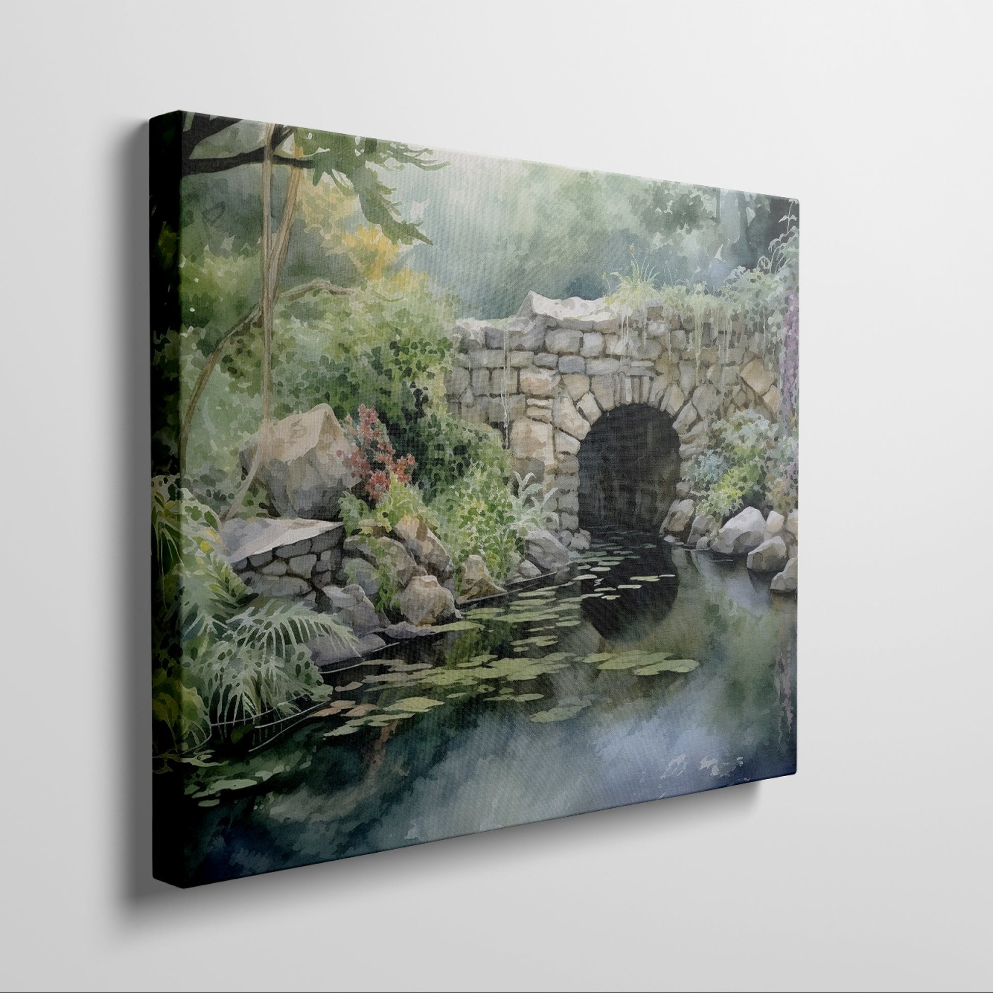 Framed canvas print of a serene watercolor painting of a rustic stone bridge over a calm pond with water lilies