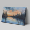 Framed canvas print of a tranquil watercolor landscape depicting a serene lakeside at sunset with reflections of woodland