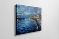 Framed canvas print of twilight seascape with vivid blue waters and illuminated harbour lights