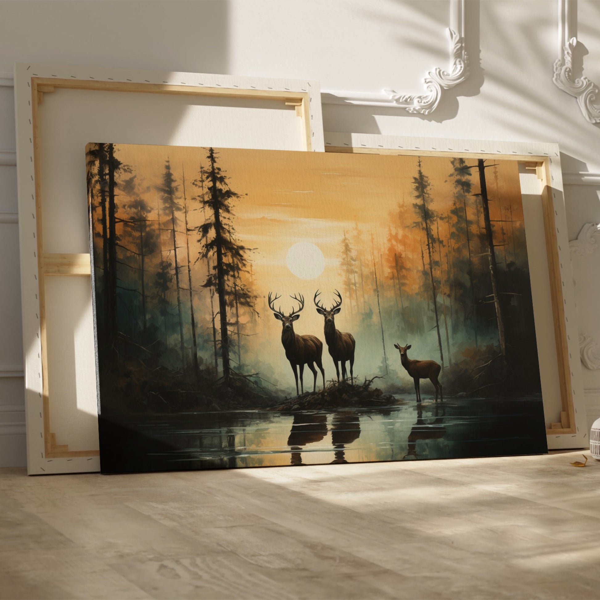 Framed canvas print of deer silhouetted against a forest sunset with reflections on water