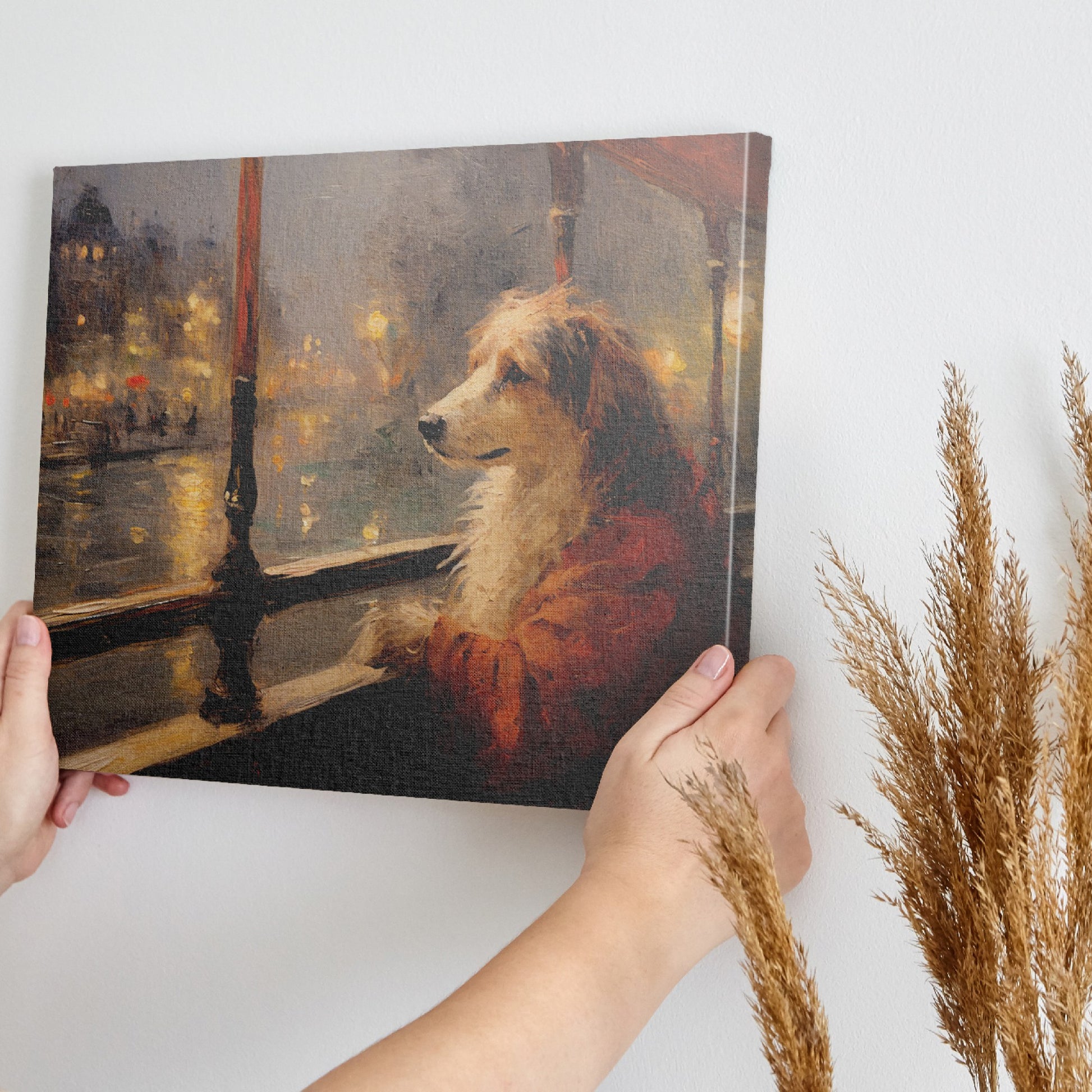 Framed canvas print of a dog looking out of a window at a city scene with warm, glowing lights