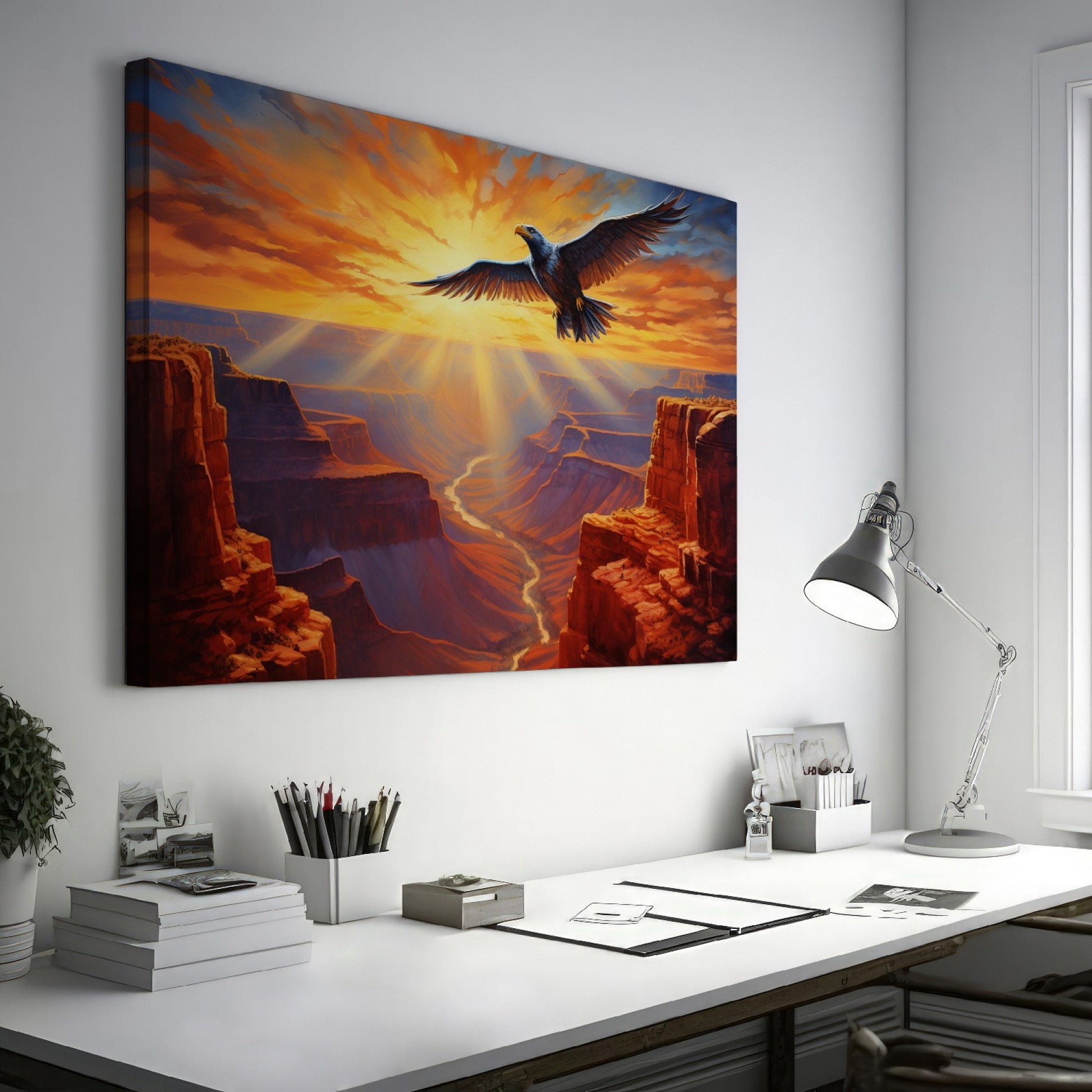 Framed canvas print of a majestic eagle soaring over a stunning canyon at sunset with radiant orange and red hues