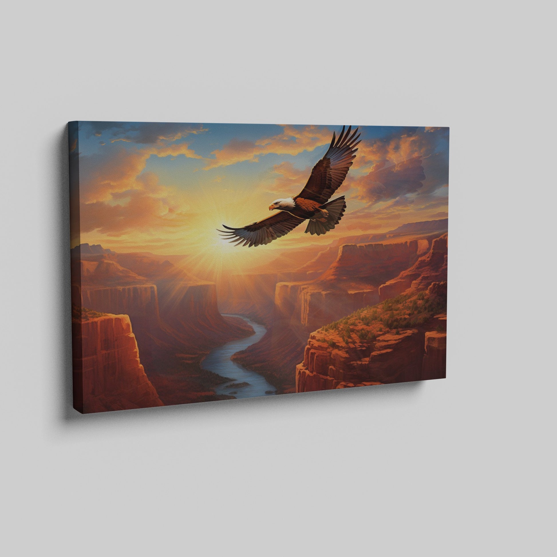 Framed canvas print of a majestic eagle flying over a sunset-lit river canyon