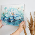 Framed canvas print of a serene watercolour lotus flower in delicate blues and whites