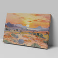 Framed canvas print of an impressionist painting depicting a desert sunset with warm colours