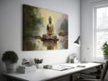 Framed canvas print of a serene golden Buddha seated by water with impressionistic background