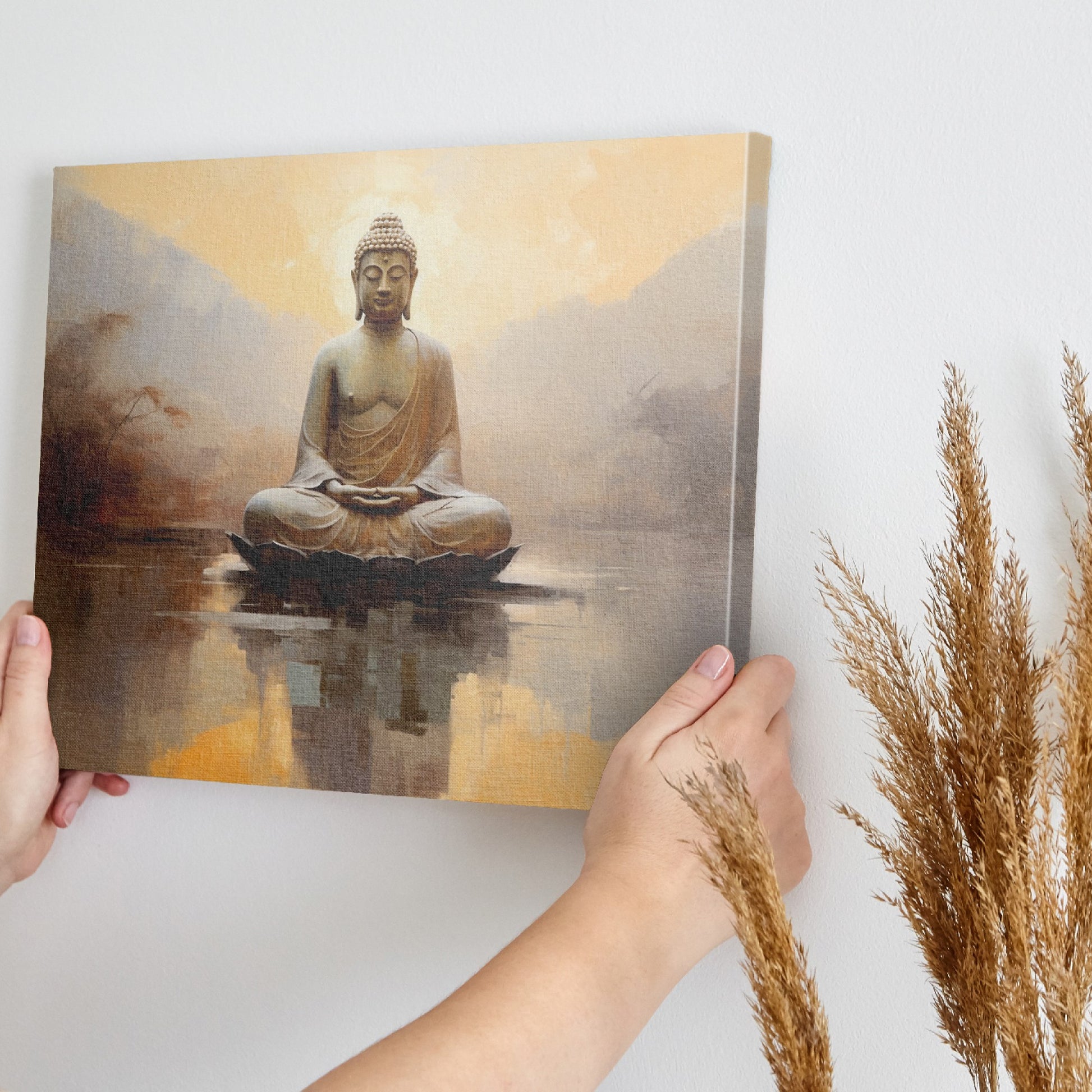 Framed canvas print of a meditative Buddha against a calming sunset and reflective water