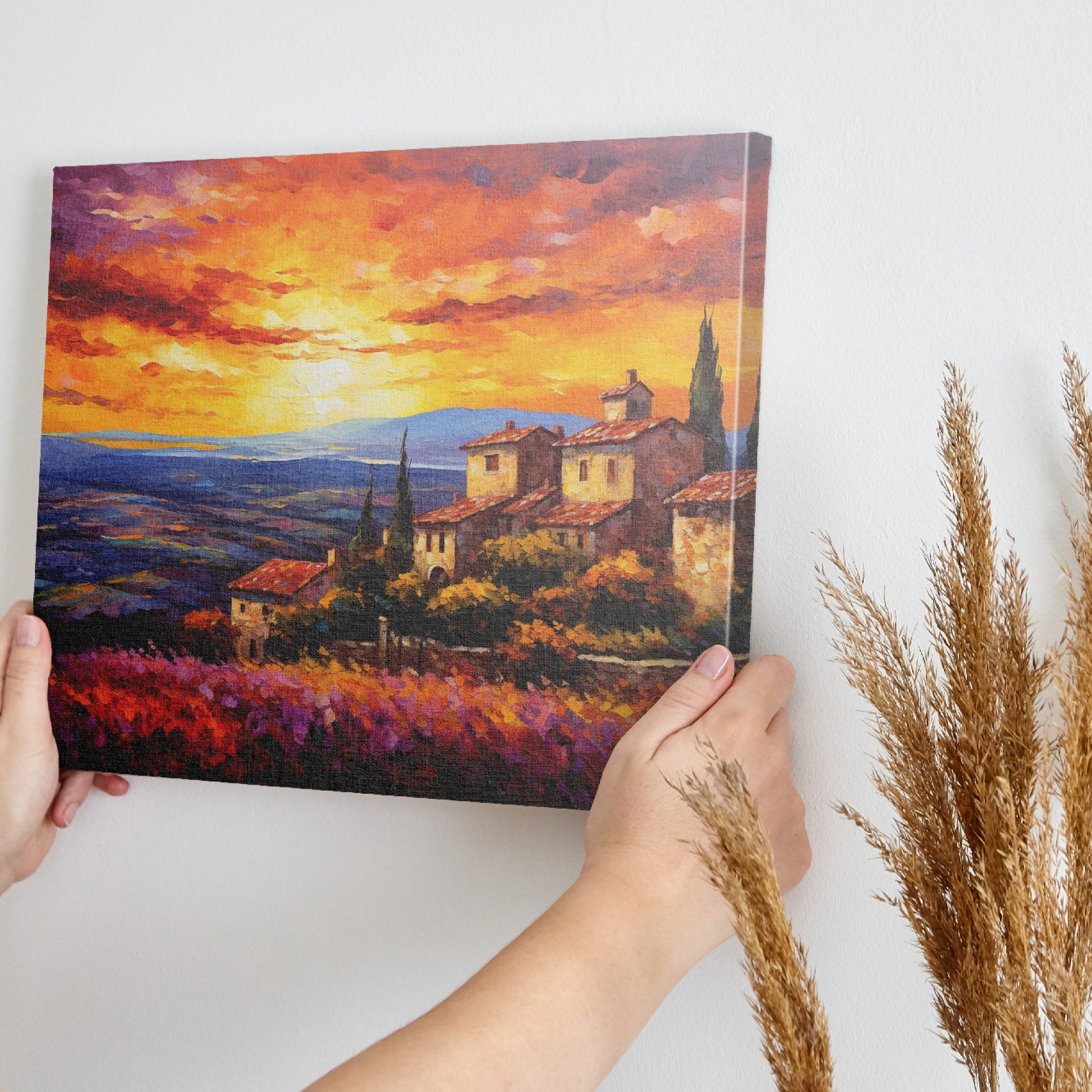 Framed canvas print of an Impressionist Tuscan landscape with a vibrant sunset sky, overlooking lavender fields and rustic houses.