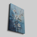 Framed canvas print of elegant flowers and berries against a blue abstract background