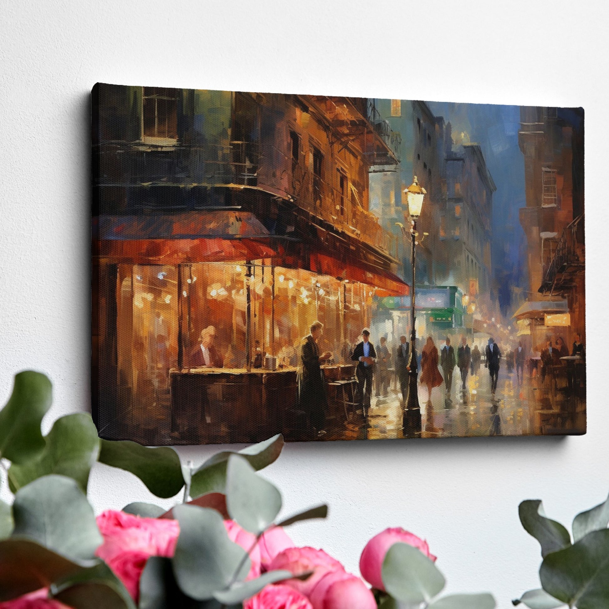 Framed canvas print of an impressionistic cityscape at twilight with a café terrace and bustling streets