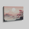 Framed canvas print of a tranquil pink sunrise over mountains with a reflective lake and silhouette of a tree