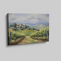 Framed canvas print of a lush Tuscan vineyard landscape with green vine rows and rustic farmhouse