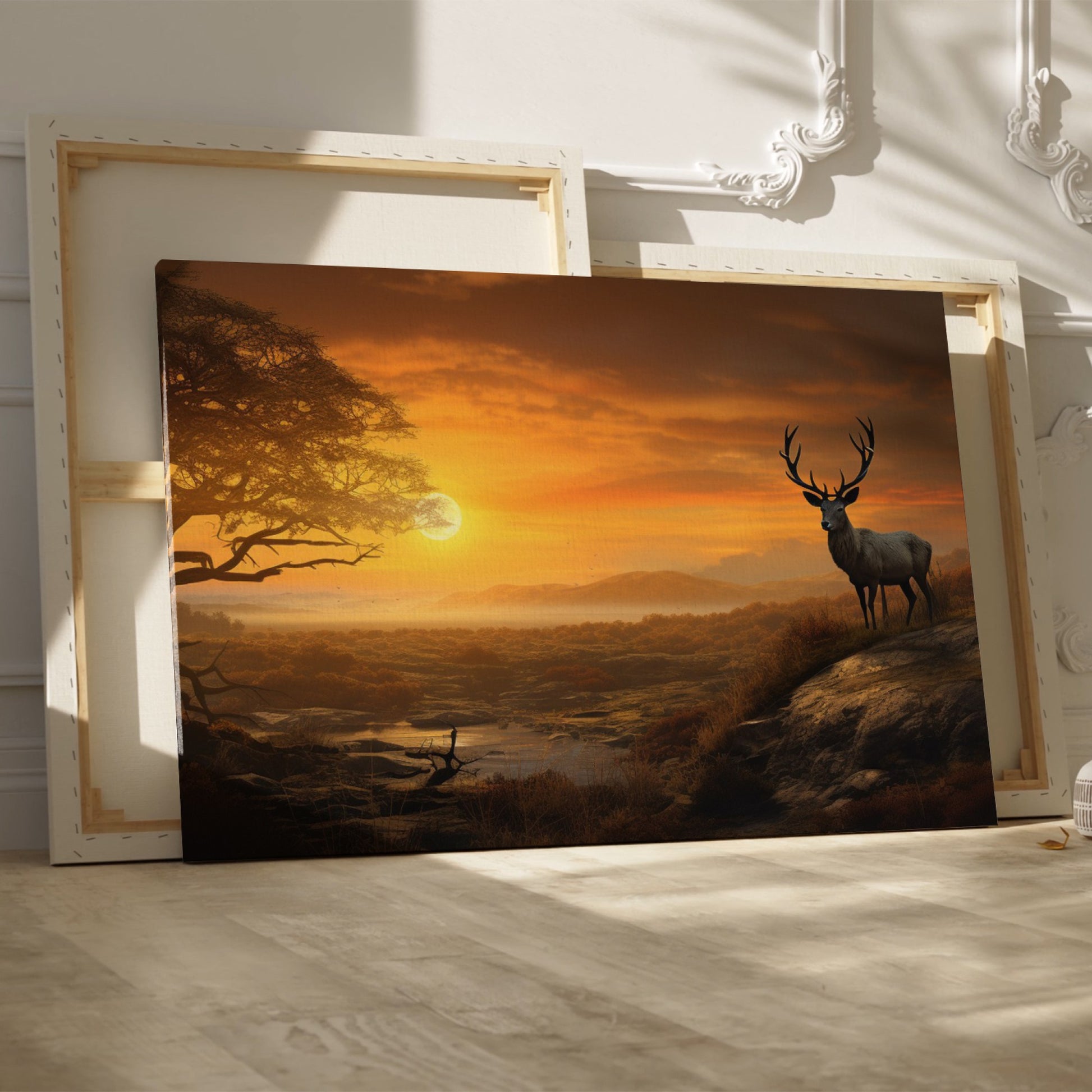 Framed canvas print of a majestic stag in a savanna sunset landscape with warm orange hues