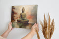 Framed canvas print of a serene Buddha in meditation with abstract background