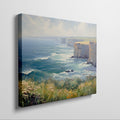 Framed canvas print of an impressionistic seascape with cliffs, wildflowers, and ocean