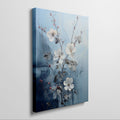 Framed canvas print of ethereal white blossoms with red berries against a textured blue abstract background