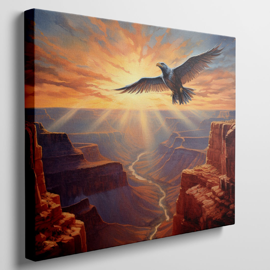 Framed canvas print of a majestic eagle soaring over a stunning canyon at sunset with radiant orange and red hues