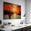 Framed canvas print of a vibrant impressionist sailboat against an orange hued sunset