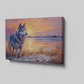 Framed canvas print of a Husky in silhouette against a colourful sunset with reflection on water