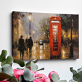 Framed canvas print of an impressionistic painting of a rainy London street with a red telephone box